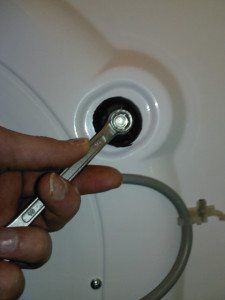 Remove the washing machine's transport bolts