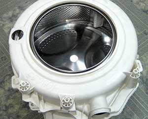 Разглобяване на резервоара на пералнята