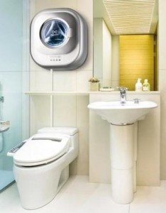 Wall-mounted washing machine in the toilet