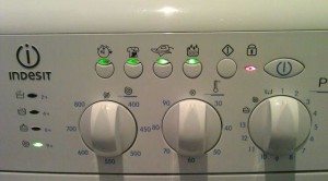 All the indicators on the washing machine are flashing.