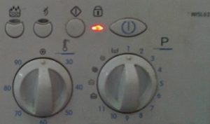 The key or lock indicator is on on the washing machine.