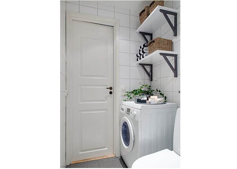 shelves in the bathroom above the washing machine