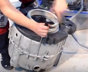 unscrew the screws holding the tank halves