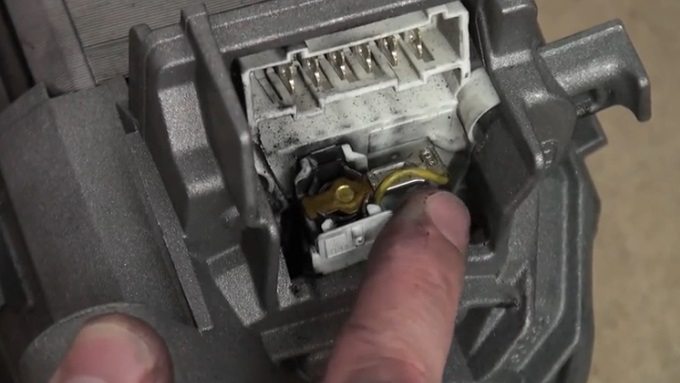 Where are the brushes on the motor?