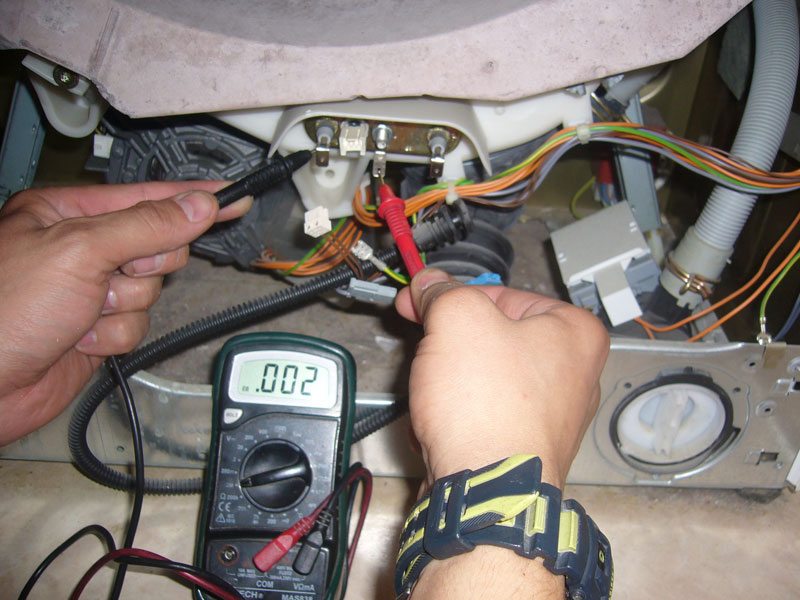 checking the heating element with a multimeter