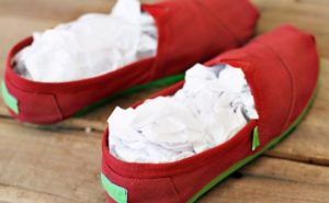 To help your slippers dry better, stuff them with paper.
