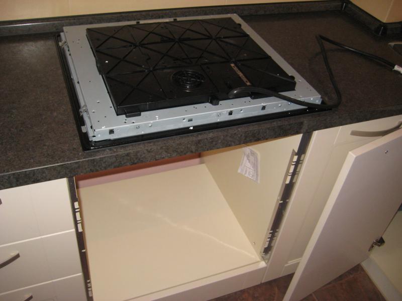 The process of installing a dishwasher under a cooktop