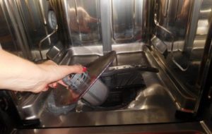 cleaning the trash filter