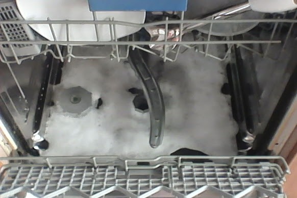 foam at the bottom of the dishwasher