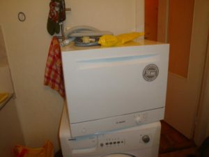 Dishwasher on a washing machine