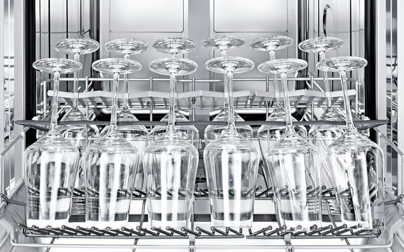 arranging glasses in the dishwasher