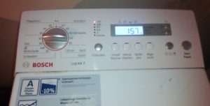 A modern, top-loading washing machine made in Germany