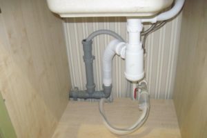 connecting the washing machine to utilities
