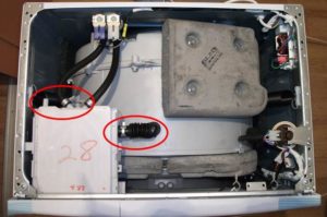 Hoses from the tray in the LG washing machine