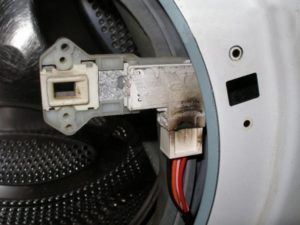 Washing machine locking devices