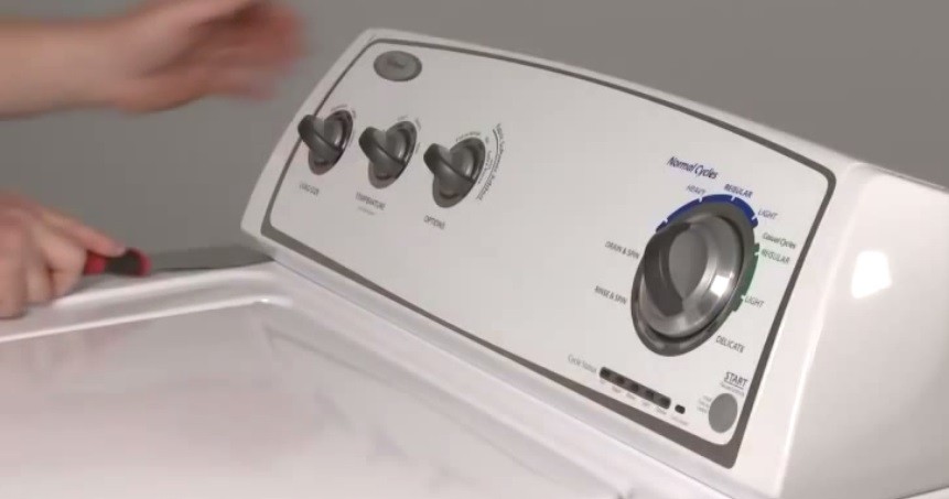 Insert a spatula into the gap to remove the panel.