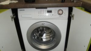 Before removing the top cover, take out the Samsung machine