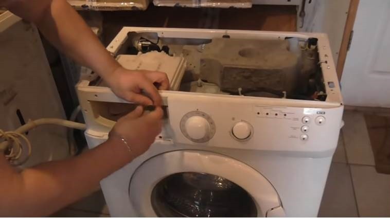 Unscrew the screws to remove the control panel.