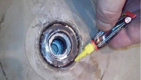 We'll lubricate and glue the new bearing.