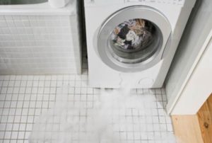 The washing machine door is leaking.