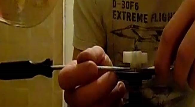 we push out the impeller with two flat-head screwdrivers