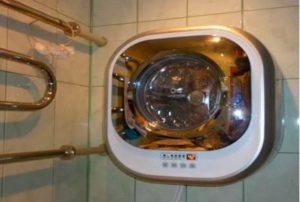We will purchase and install a wall-mounted washing machine.