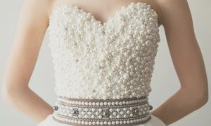 The dress's corset has a lot of embellishments that could fall off.