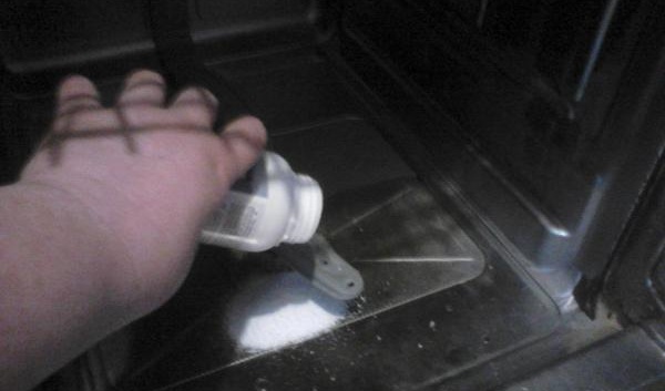 pour degreaser into the bottom of the dishwasher