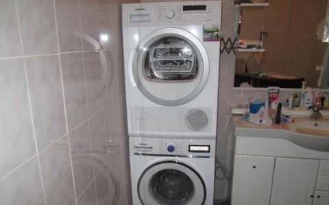 installation of a drying machine in a column