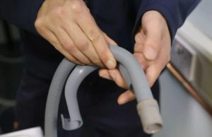 How to clean the drain hose in an LG washing machine?