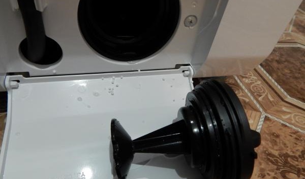 unscrew the trash filter