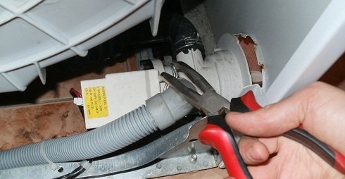 remove the drain hose