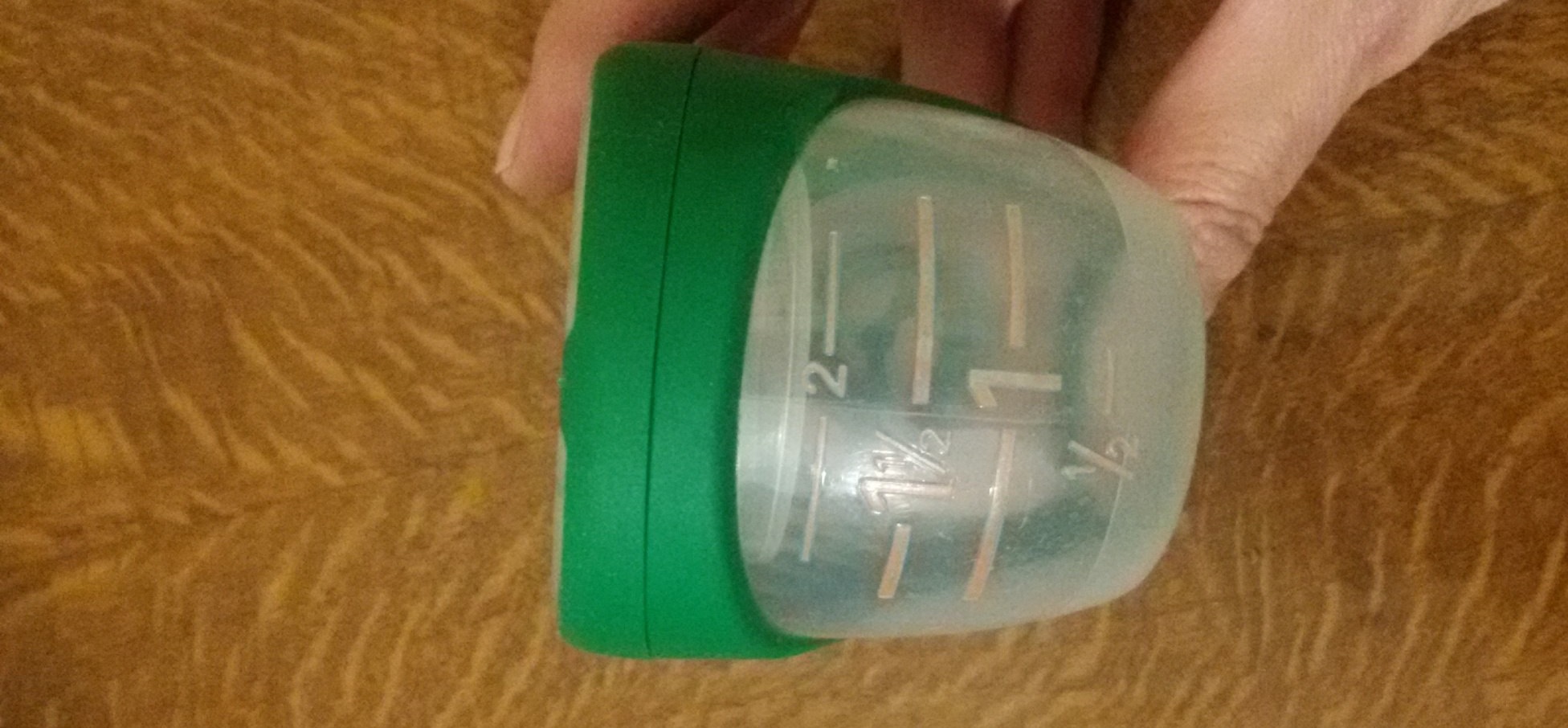 liquid detergent container for washing machines