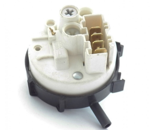 Where is the pressure switch located in an Indesit washing machine?