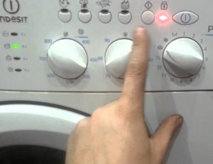 How to reset an Indesit washing machine?