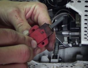 How to replace brushes on an Indesit washing machine?