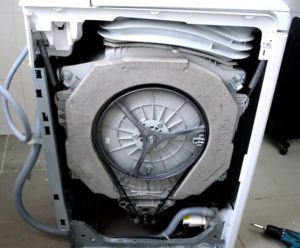 How to disassemble an Indesit top-loading washing machine
