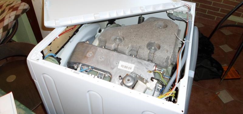 First, remove the top cover.