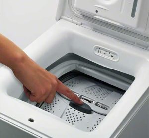 How to properly wash clothes in a top-loading washing machine
