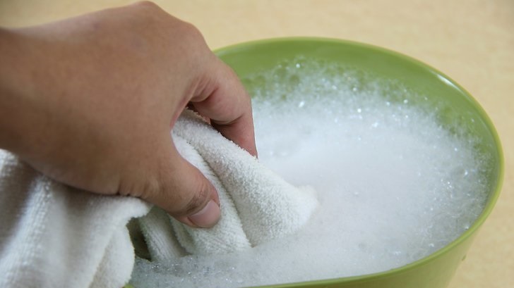 apply soapy water to the embroidery