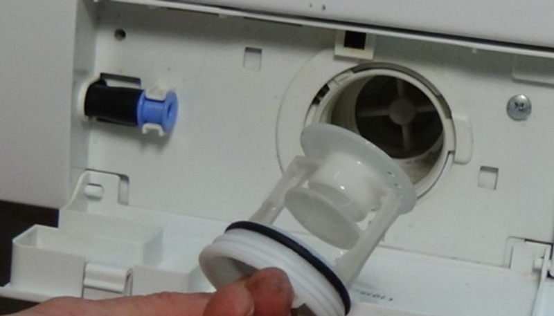 unscrew the trash filter