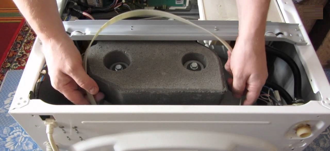 We change the belt without removing the rear panel.