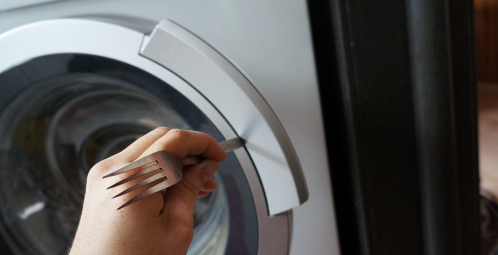 we open the door with a spoon