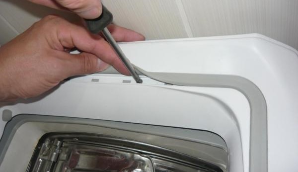 removing the cover on a vertical