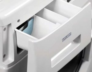 Where do I pour liquid detergent into the Atlant washing machine?