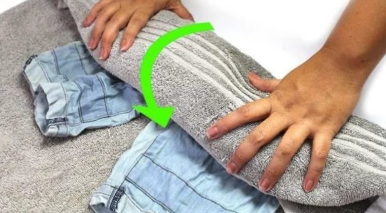 Jeans can be dried using towels.