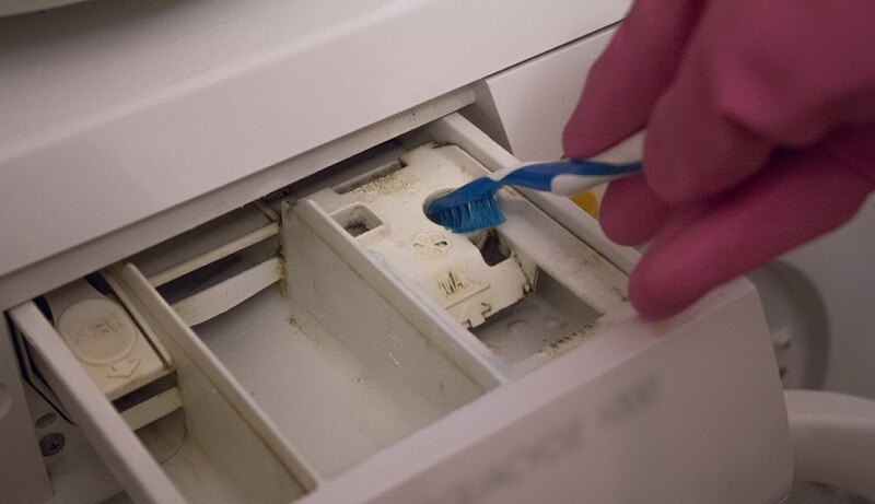 Use a brush to clean hard-to-reach areas.