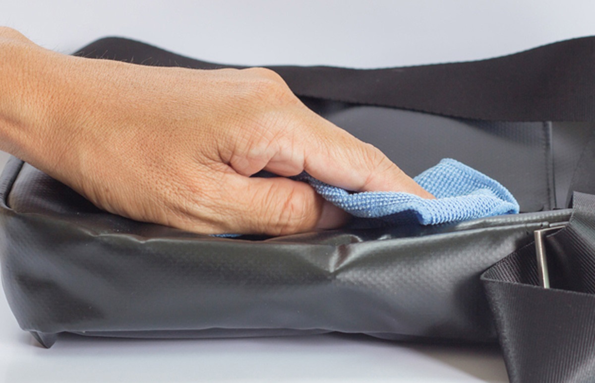 We clean a leatherette bag the traditional way