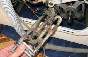 Водата в пералнята ми Zanussi не се загрява.