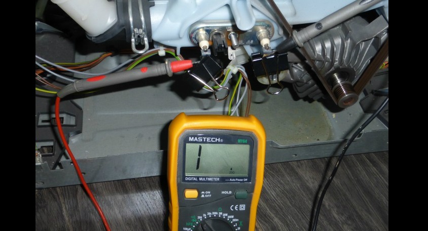 We carefully check the heating element with a multimeter